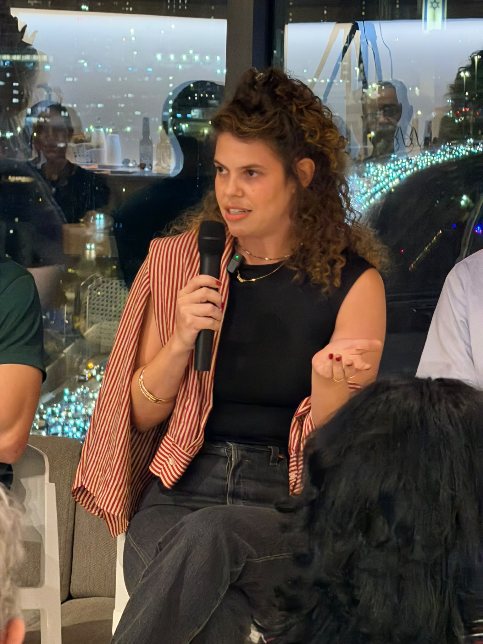 Inbal Gilead speaking on a panel